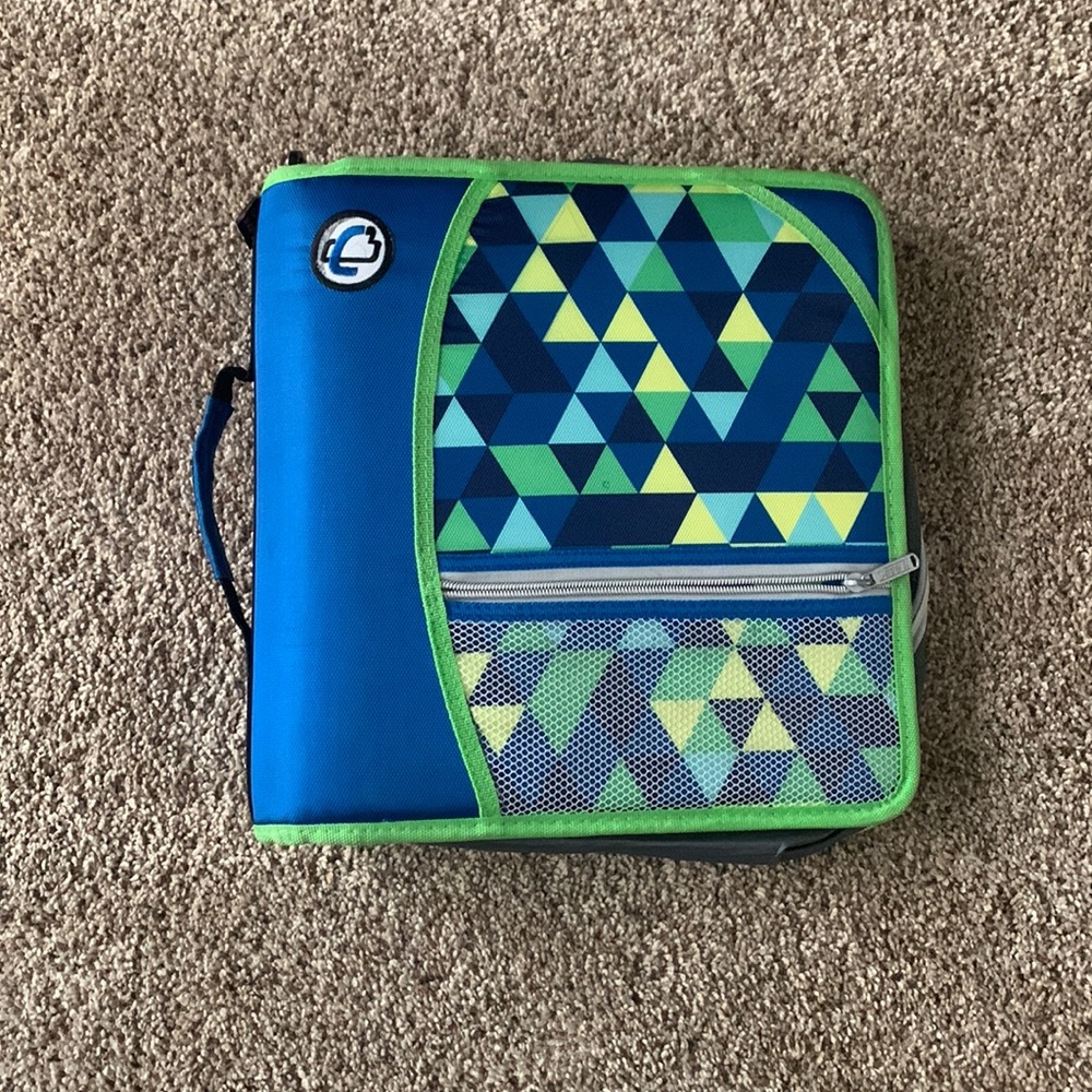 This is a Case it binder that is blue and green with triangles
